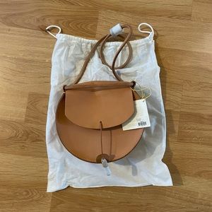 New with tags Jujumade tan Drum bag.